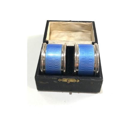 Pair of antique boxed silver and enamel napkin rings birmingham silver hallmarks 