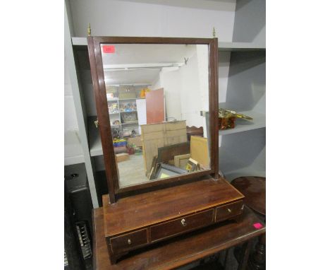An Edwardian mahogany swing mirror with inlaid decoration, one long flanked by two short drawers with gilt brass knops and fi