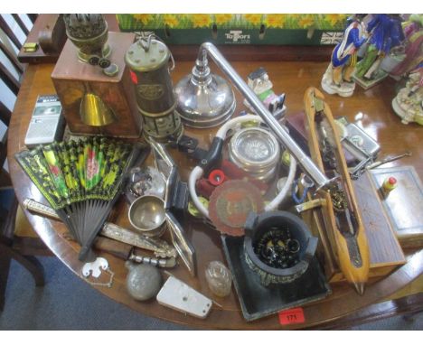 A mixed lot to include a fan, Arts &amp; Crafts oil lamp, Caithness paperweight, miners lamp and other items 