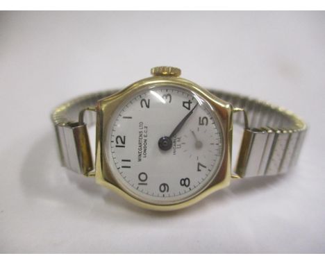 A Winegarten Ltd 9ct gold ladies manual wind wristwatch 