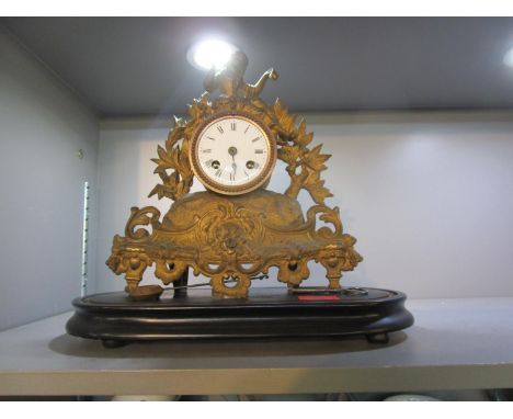 A Japy Freres French gilt metal mantle clock with white enamel Roman dial, the movement striking on a bell, with key and pend