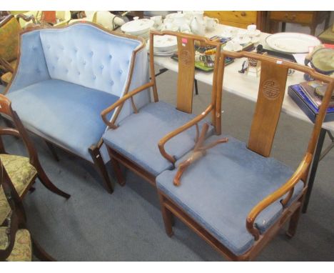 An early 20th century walnut framed, button back, blue upholstered sofa, together with two Chinese armchairs 