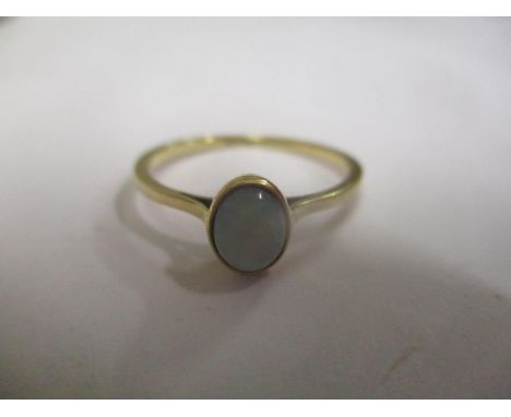 An 18ct gold opal inset ring 