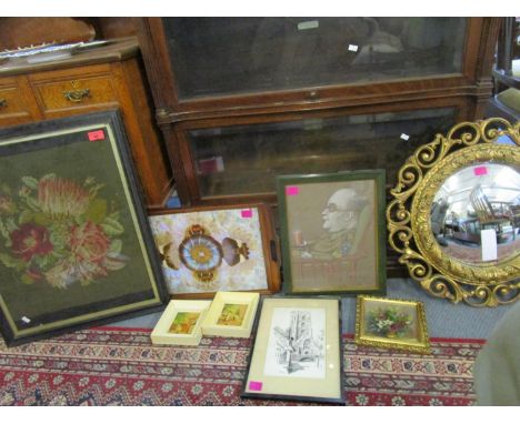 A group of pictures and a gilt framed Butler's mirror to include a Victorian Berlin wool-work tapestry of flowers, a Brazilia