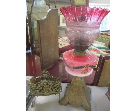A Victorian oil lamp having a painted reservoir and etched glass shade, together with a letter rack 