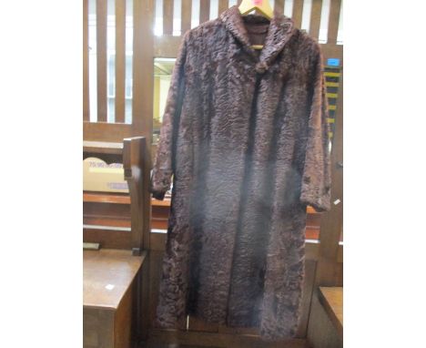 A vintage dark brown Astrakhan full length coat, 40" chest x 43" long 