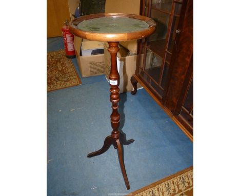 A tall tripod based lamp/wine Table, the circular top having a green leather inset, 12 3/16'' diameter x 36'' high.