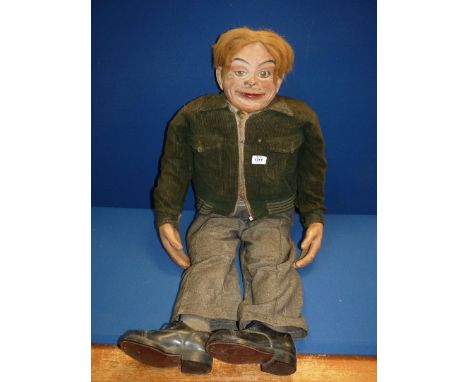 A mid 20th century Ventriloquist's Dummy, "James" With Leather Shoes, Corduroy Jacket and Tie, the eyes and the top and botto