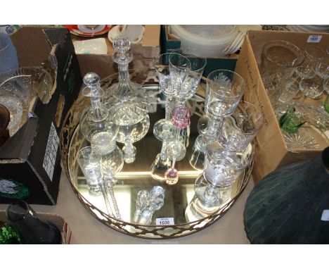 A mirrored tray, an air twist stemmed goblet, a pretty star cut decanter, a set of four jubilee giblets, etc.