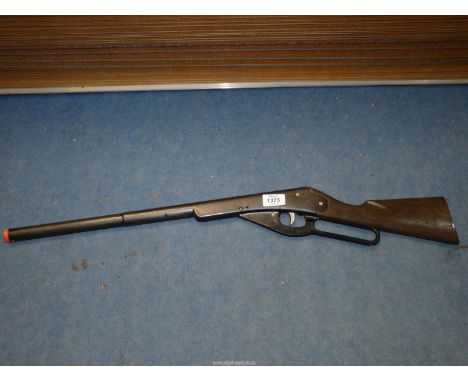 ***COLLECTION ONLY**A Daisy Winchester style cocking gun having a plastic stock, 30 7/16'' long overall. (Cocked and fired no
