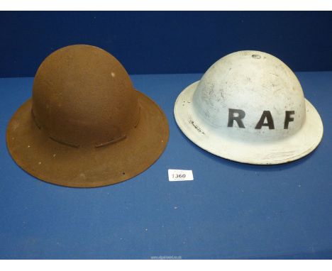 A 2nd world war  R.A.F tin helmet, along with a 1947 WWII British Zuckerman helmet.