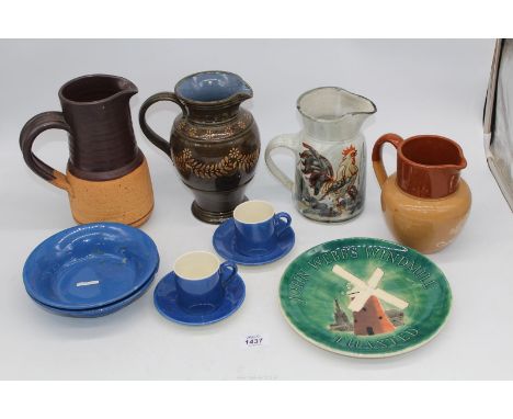A Moorcroft John Webb windmill plate and two Moorcroft "Liberty Blue" coffee cans, saucers and bowls plus four pottery jugs t