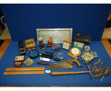 A quantity of miscellanea including alarm clocks, weighing scales, magnifying glasses, clockwork toy and tools.