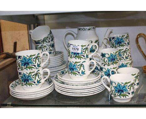 A Midwinter part tea/coffee set including six large and six small cups, twelve saucers, twelve tea plates and two milk jugs, 