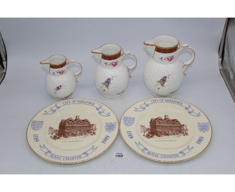 Two city of Hereford Royal Charter plates, and Coalport  three graduated Caughley mask head jugs, 8", 7" and 6" tall.