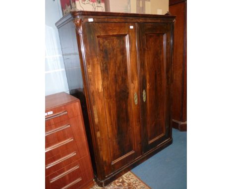 A highly polished Walnut finished double doored Wardrobe/cupboard, 51 1/2'' wide x 22 1/2'' deep x 69'' high.