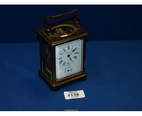 A Sheppard's & Co., 4 Regent Street, carriage clock with key.
