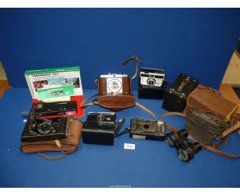 A quantity of Cameras including Hanimex, Kodak Instamatic 200, Dacora, No. 2 Brownie etc., plus a pair of field glasses.