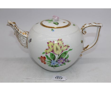 A Herend tea pot with gilding and floral design, and rose finial.