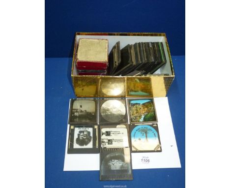 A box of Magic Lantern slides (50) including Swiss landscapes, etc. (plus damaged slides).