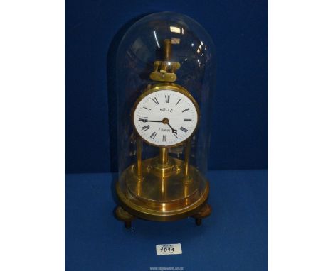 A Bulle Paris Electromagnetic Mantle Clock, c. 1910, having brass base and movement, with a glass dome, 5 1/2" wide x 11 1/2"