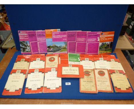 A box of Ordnance Survey maps.