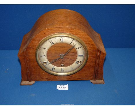 A Westminster chiming Mantle Clock with pendulum, but no key.