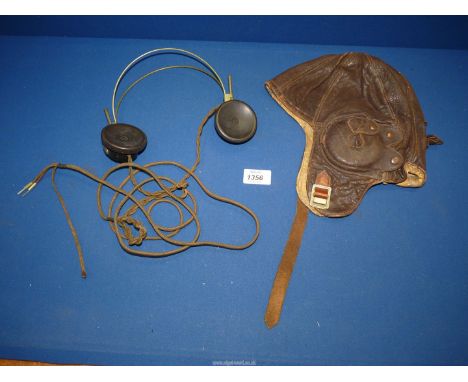 A set of Military headset by Western Electric, along with a D Lewis Ltd. leather aviation helmet.