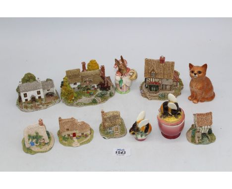 A small quantity of ornaments including Lilliput Cottages, Goebel "Bee" lidded pot and a pepper pot, a Beswick  Mrs Rabbit [ 