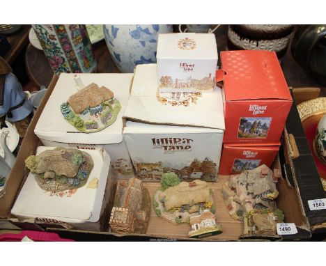 A box of Lilliput Lane ornaments including 'Wenlock Rise', 'Chine Cot', 'Honeysuckle Cottage' etc.