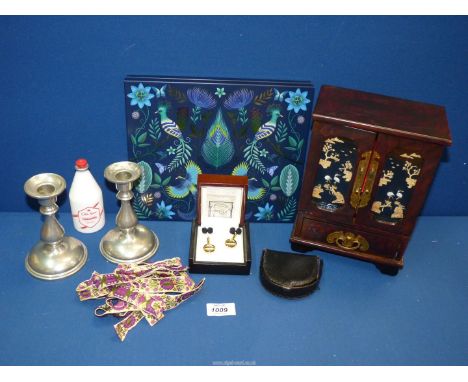A pair of pewter candlesticks, plus an oriental jewellery box with boxed cufflinks, etc.