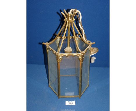 An hexagonal glass and brass hall lantern light, 13 1/2'' tall.