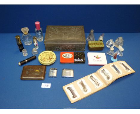 A small quantity of miscellanea including Ronson lighters, cigarette case, empty perfume bottles, cigarette cards etc.