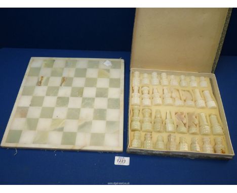An Onyx chessboard and pieces.
