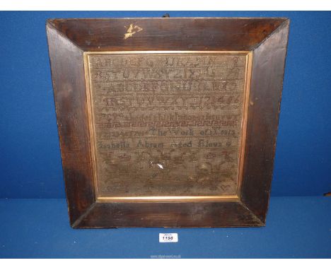 An old framed and glazed sampler by Isabella Abram aged eleven years, 17'' x 16 1/2''.