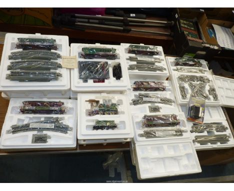 A Hawthorne village "Thomas Kinkade Christmas Express" train set by Bachmann to include: locomotive and tender, seven carriag