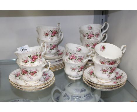Ten Royal Albert 'Lavender Rose' teacups, saucers and tea plates.