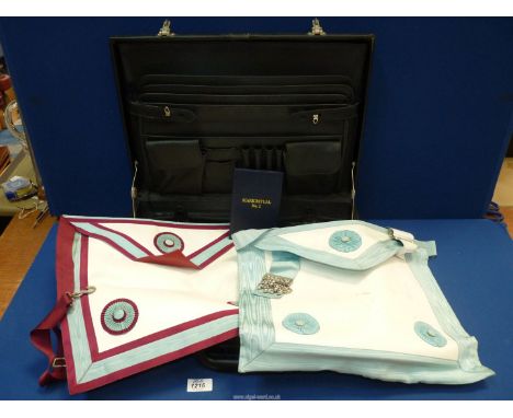 Two Masonic aprons: Mark and Craft plus Mark Ritual No. 1 book all in a black briefcase.