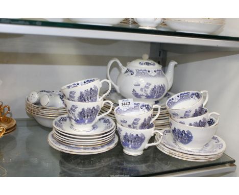 A quantity of Duchess blue and white china "Willow" to include:six cups and saucers, six tea plates, a cake plate, a tea pot 