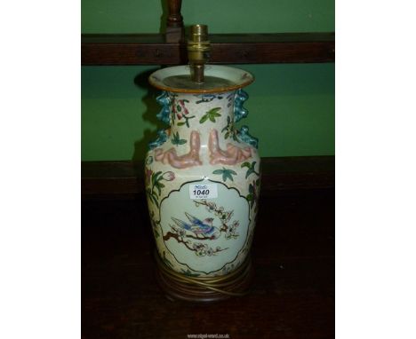A Chinese Vase/table Lamp on a wooden base, 13 1/2" tall.
