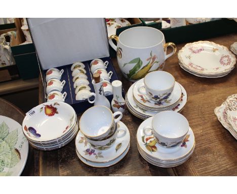 A quantity of Royal Worcester "Evesham" china to include: boxed chocolate cups, four tea cups, plates, bowls, etc.