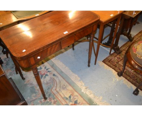 Early 19th Century mahogany crossbanded and line inlaid D-shaped fold-over card table on turned supports