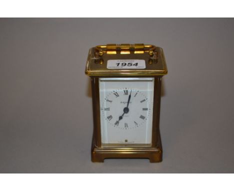 Small 20th Century French brass cased carriage clock, the enamel dial with Roman numerals, signed Bayard