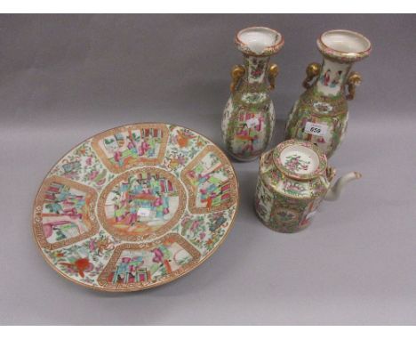 Pair of small 19th Century Canton famille rose baluster form vases (one badly damaged, the other with foot and rim chips), 10