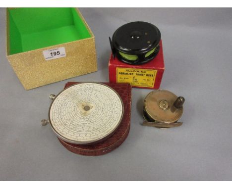 Allcocks ' Aerialite ' 3.25in trout reel in original box, together with a small brass fishing reel and a Fowler's Magnum long