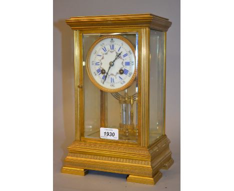 19th Century French gilt brass four glass library clock, the enamel dial with Arabic and Roman numerals painted with floral s