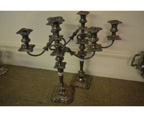 Pair of silver plated on copper three branch candelabra