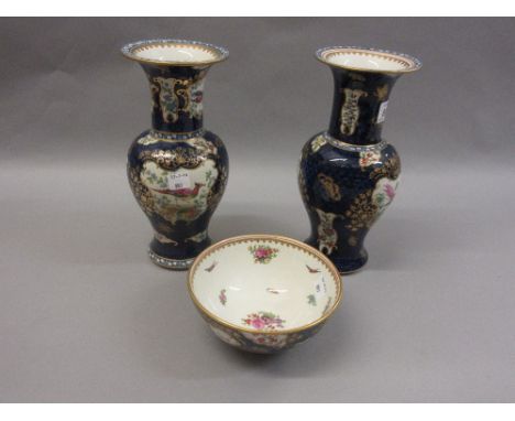 Pair of Booths vases decorated with exotic birds on a blue scale ground, together with a similar bowl