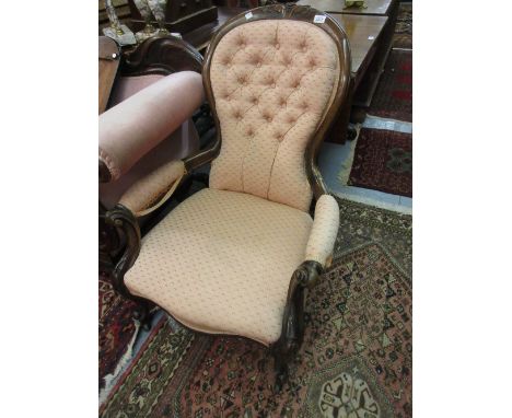 Victorian carved walnut and button upholstered open armchair together with a matching low seat nursing chair