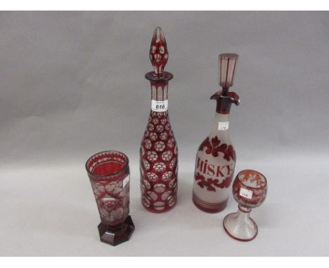 19th Century Bohemian red overlay glass decanter with stopper, a similar red flash glass decanter and goblet together with an